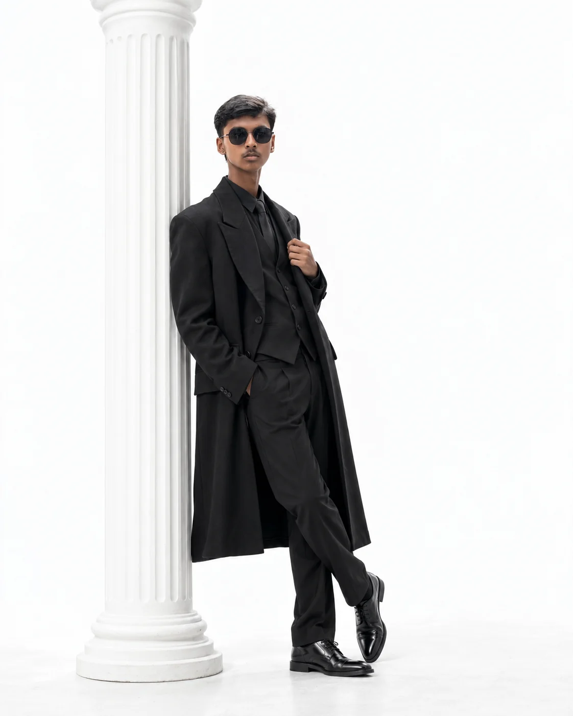 Nithish, Marketing head, in a black suit